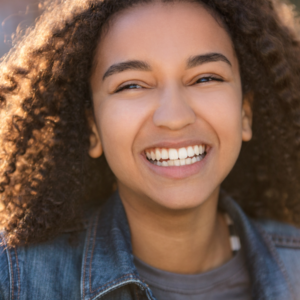 girl with straight teeth smiling